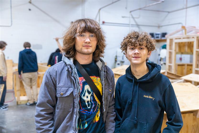 Students build doghouses